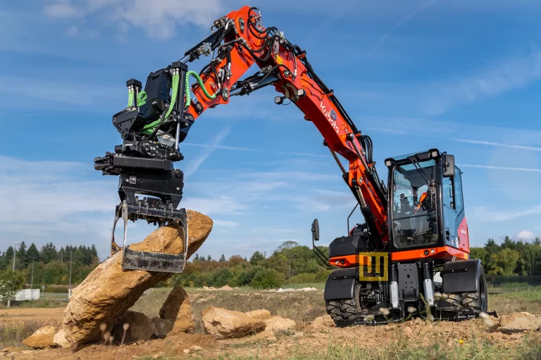 Koparka kołowa Kubota KW115 podnoszenie chwytakiem